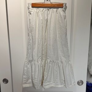 White peplum midi skirt with pockets